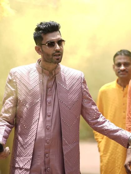 Engaging with the guests as I make my way through the crowd. Personal interaction is key to making everyone feel included.