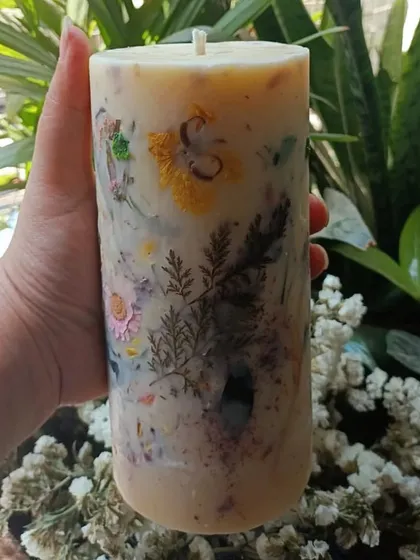Flowers and scented candles are a secret to winning hearts. These two large floral love pillar candles were customized for a client in lavender and other luxury fragrances.