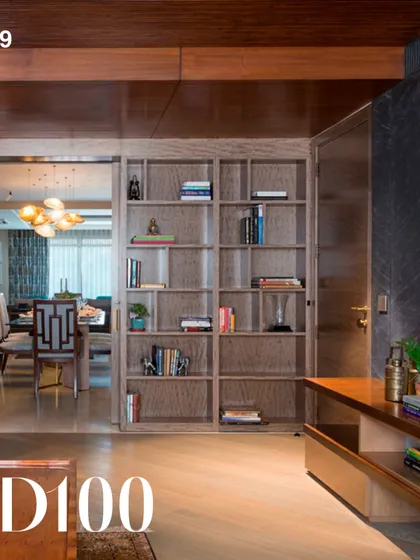 Our Chandhiok Residence project, featured in the 2019 AD100 list. This space showcases our use of custom shelving and a seamless flow between living and dining areas.