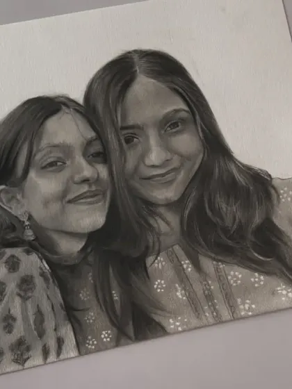 A finished A4 portrait of two friends or sisters. Capturing shared smiles and creating a memory they can share is always a pleasure.