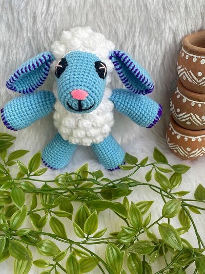 This cute blue sheep is from the popular kids' show Cocomelon. The bobble stitch gives it a fluffy texture, and the bright colors make it a perfect toy for little ones.