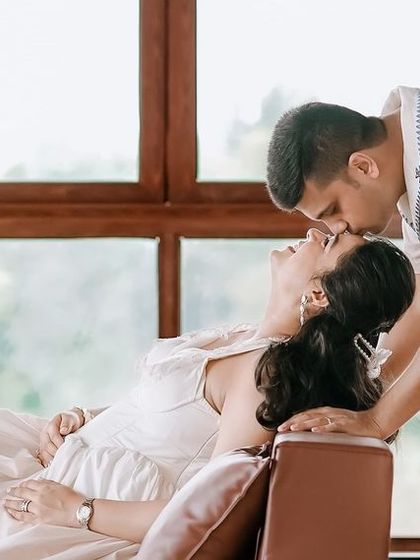 A tender moment captured during an at-home maternity shoot. I look for authentic interactions that tell the story of your relationship.