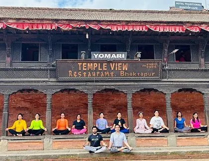 Yoga can be practiced anywhere. Here, our group finds a moment of peace and balance, meditating together at the Bhaktapur Durbar Square in Nepal, a UNESCO World Heritage Site. We blend our spiritual practice with the exploration of rich cultural histories.