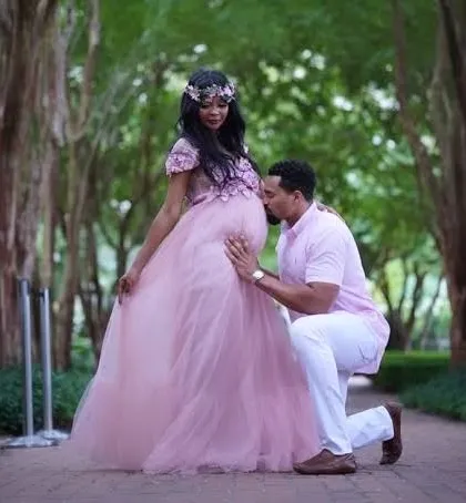 A classic and beautiful pose from an outdoor maternity photoshoot. We work with expecting couples to create timeless portraits that celebrate this special time in their lives.