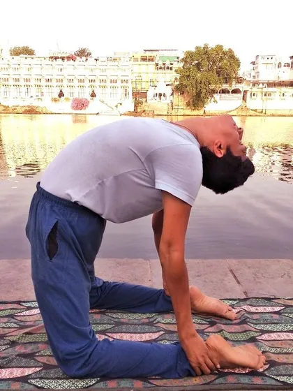 Ushtrasana, the Camel Pose, is a powerful backbend that opens the heart chakra, Anahata. This posture stretches the entire front of the body and improves spinal flexibility. I teach this asana to help release stored emotions and cultivate a sense of openness and courage.