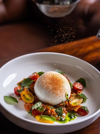 The Burrata Salad is as refreshing and delicious as it looks, squashing the misconception that salads are boring. A final dusting of spice adds warmth and colour.