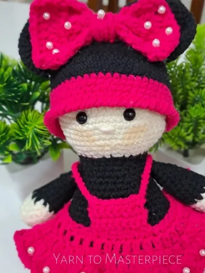 Another look at my Minnie Mouse doll, showing her sweet face and detailed bow.