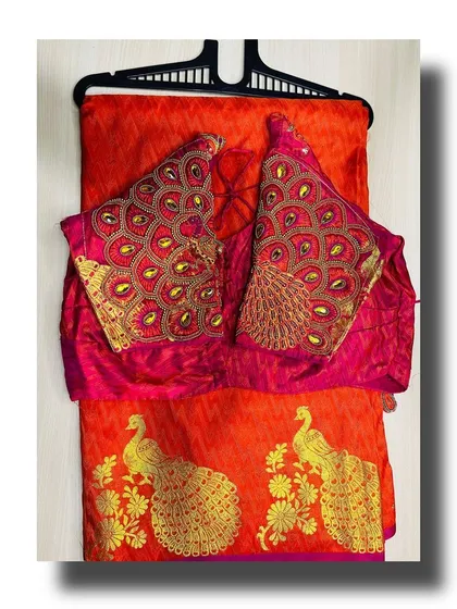I love bringing thematic designs to life, like this peacock-inspired hand embroidery. The detailed threadwork on the sleeves and the matching motifs on the saree itself are examples of the custom handwork my team and I specialize in.