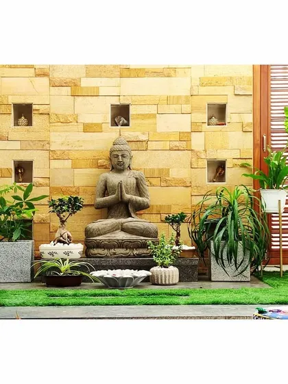 Creating a serene meditation corner for a client in Mysore. I used a combination of artificial turf, a central Buddha statue, and a curated selection of indoor plants like bonsai and ferns to design this tranquil space.