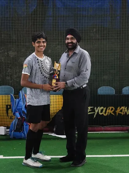 Celebrating success is part of our journey. Here, one of our talented players is recognized with a trophy at the Sunday Sultans Hockey Carnival, a proud moment for our entire team.