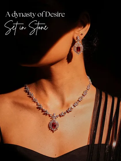 The Ruby Dynasty Set, worn to showcase its regal brilliance. The deep red of the Mozambique rubies paired with diamonds creates a look of royal elegance, perfect for a grand celebration.