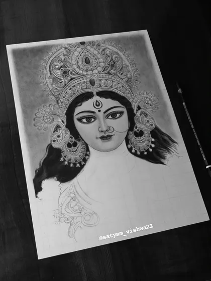 Here, the focus was on completing Maa's face, hair, and crown. Getting the expression right is the most important part for me before moving on to the rest of the sketch.