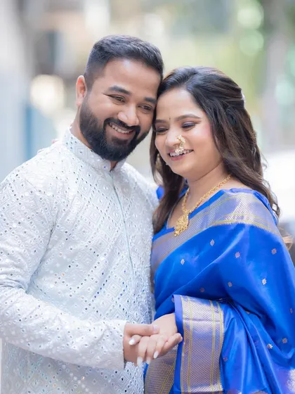 Subtle hues, soft smiles, and forever promises. This couple's portrait from their engagement day captures a beautiful, intimate moment.