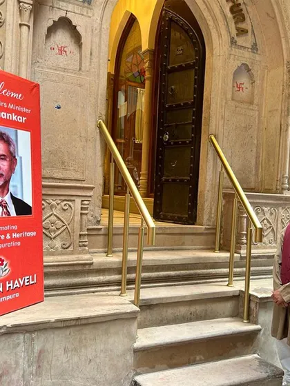 The entrance to the Golden Haveli, prepared to welcome Dr. S. Jaishankar for the inauguration. The restored facade and traditional doorman signal the blend of heritage and hospitality that defines the project.