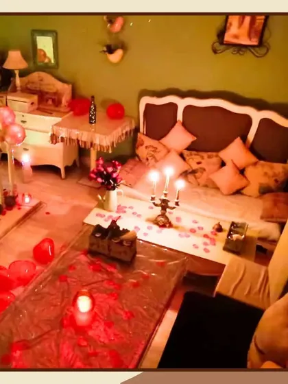 Here is another view of a private dining setup, with the floor covered in rose petals and balloons. I take care of these details so you can focus on celebrating your special moment together.