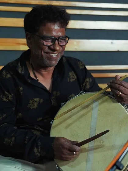 A joyful moment with one of the folk percussionists from Karnataka. The happiness and energy of the artists are a vital part of the music we create.