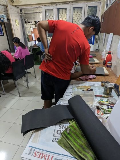 A behind the scenes look as I prepare materials and work alongside my students during a drawing session.