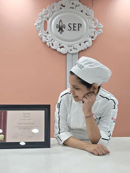 A quiet moment of reflection and pride with my certificate. This journey to becoming a certified pastry chef has been a dream I've worked so hard for.