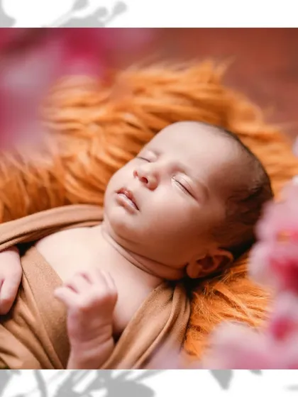 In the quiet moments of sleep, a newborn's purity shines brightest. This is a classic newborn portrait, focusing on the delicate features and serene expression that you will want to remember forever.