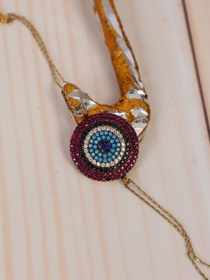 Another styled shot of the bracelet, showing its intricate details up close.