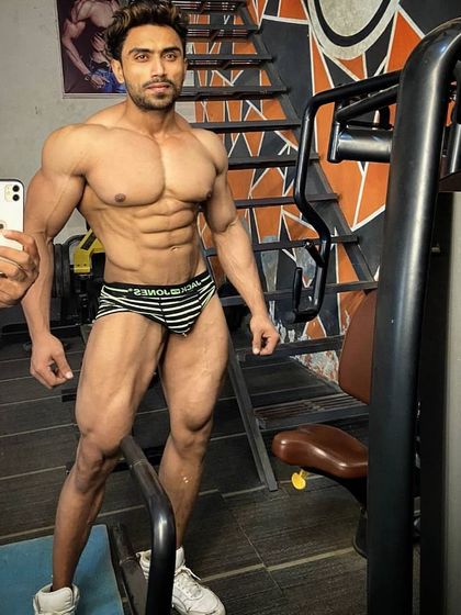 Posing in my underwear to check full body conditioning.