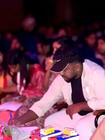 This is me in my element, focused on the performance and taking detailed notes. As a judge, I believe in a structured evaluation, ensuring every ounce of effort from the performers is seen and scored fairly 💫