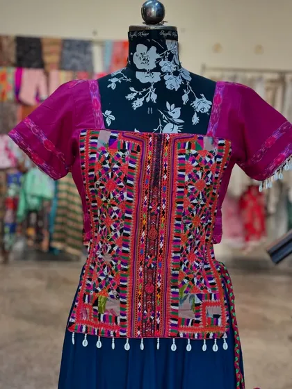 Another close-up of the stunning hand embroidery on the blouse.