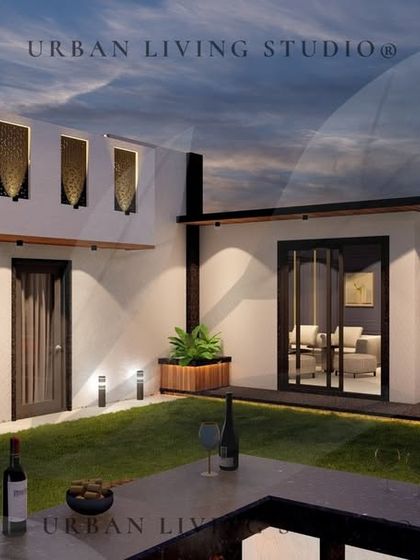 A wide view of the East Delhi terrace design, showing the relationship between the indoor lounge, the lawn, and the outdoor seating areas.