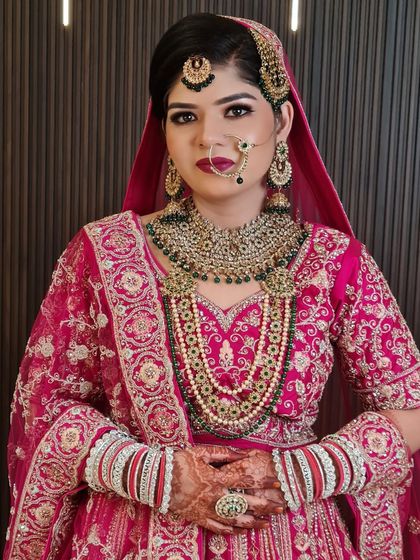 A beautiful Muslim bride from yesterday. We created a stunning look for her in a pink lehenga with heavy jewelry.