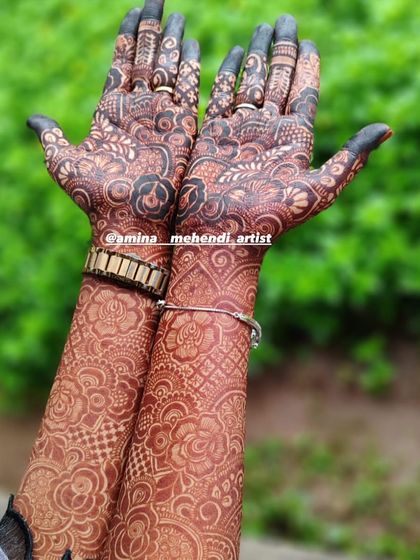 A beautiful outdoor shot of a full bridal mehendi, showing how the design looks in natural lighting.