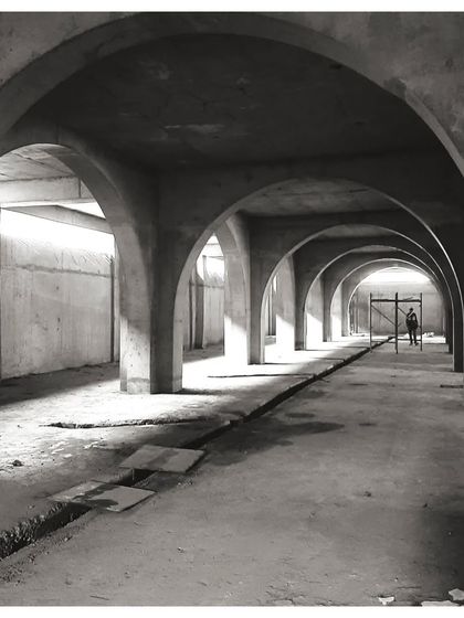 The lower floor of Sanskriti Vihara, where meditation halls are formed by modular concrete arches. Repetition, a key strategy of our ancient monuments, is used here to create a powerful, rhythmic space below grade.