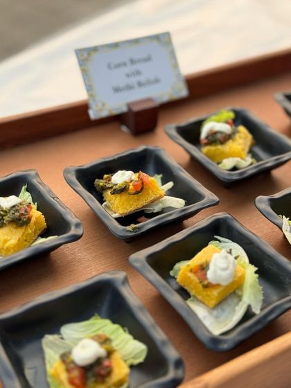 Bite-sized squares of cornbread with a savoury topping. This is a perfect pass-around appetizer for a high-tea or brunch event.