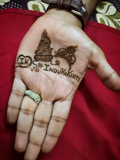 Mehndi is for everyone. For this groom, I created a simple yet meaningful design incorporating the couple's initials and wedding hashtag, proving that men can absolutely embrace this beautiful art form.