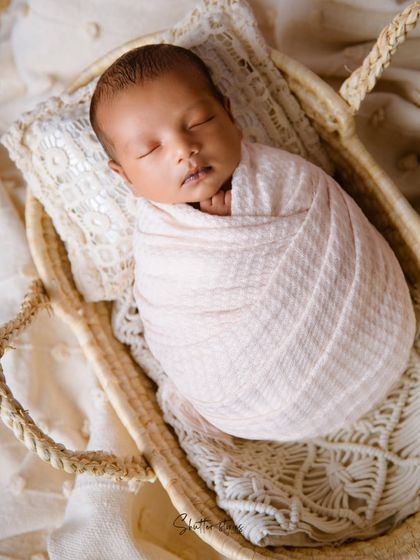 Another angle of this peaceful newborn, showcasing the simple and timeless quality of a minimal setup.