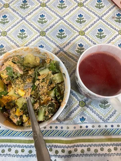 A client's meal of a hearty salad with a cup of herbal tea. This is part of a plan that has helped her lose 14 kgs to date.