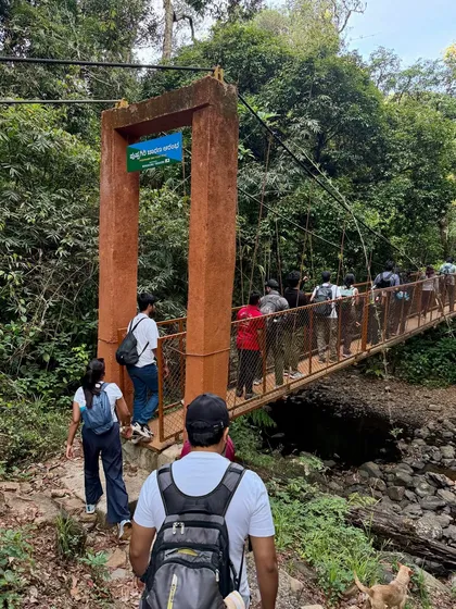 Our group crossing a suspension bridge at the start of the Kumara Parvatha trek. The adventure begins right away.