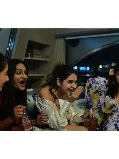 The reactions say it all. Guests laughing and amazed during a performance on a yacht for a Hendrick's Gin event.