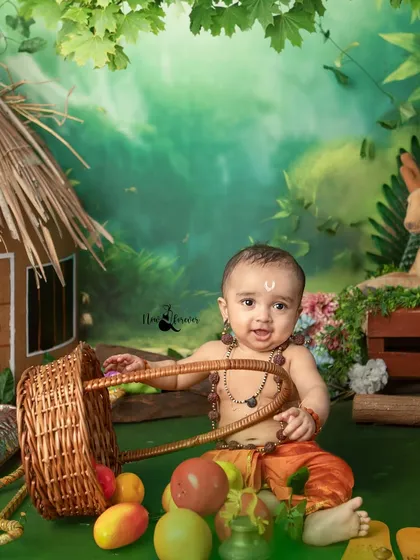 A playful moment from our Ram Navami studio session. This little one, dressed as Lord Ram, explores the forest set we created, complete with a rustic hut and fruit basket.