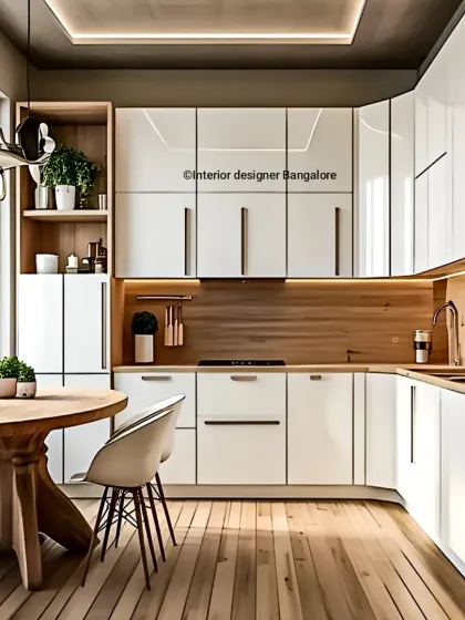 I design spaces that integrate seamlessly with your lifestyle. This L-shaped kitchen incorporates a cozy dining nook, using high-gloss white cabinetry and warm wood floors to create a bright, open, and welcoming eat-in kitchen.