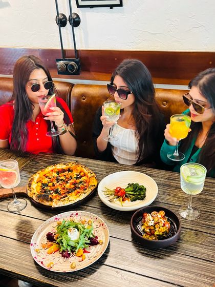 Cheers to good friends and great food. My colorful cocktails and delicious dishes are made for sharing.