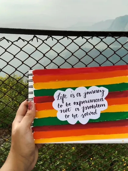 Another travel journal entry with the quote "Life is a journey to be experienced, not a problem to be solved."