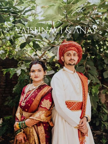 A classic portrait of the couple in their stunning Maharashtrian wedding attire.