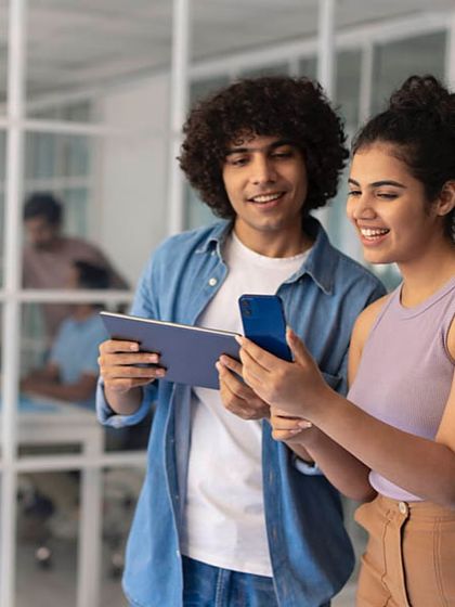 Another scene from the Images Bazaar corporate shoot, showing a casual tech-focused interaction. This demonstrates my range in portraying different office environments and roles.