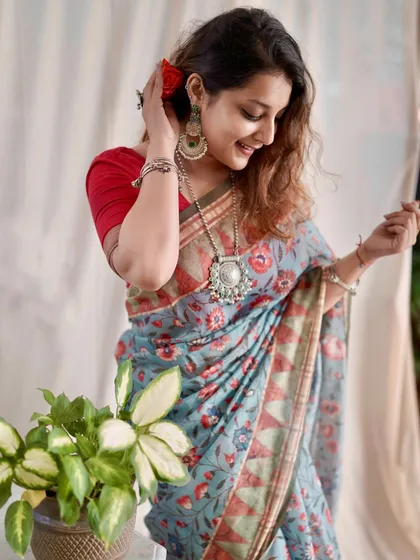 Twirling in this lightweight printed saree, paired with oxidized silver jewelry for a bohemian, desi vibe.