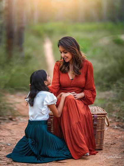 "If evolution really works, how come mothers only have two hands?" This quote always makes me smile. This portrait of Aarti with her children captures the beautiful, loving chaos of motherhood.
