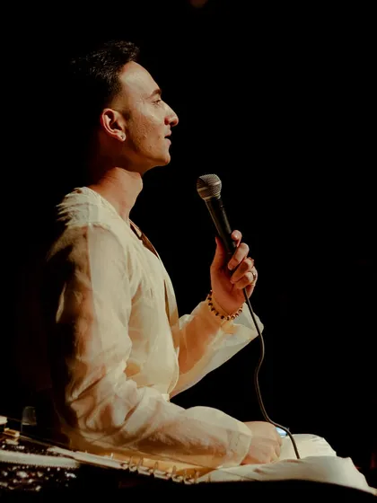 Speaking to the audience at Tagore Theatre. It's important for me to share the stories behind the music and the purpose of 'Sitar for Mental Health' to create a deeper connection.