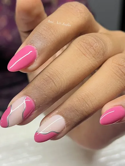 A cool abstract design with a silver chrome line over a bright pink base.