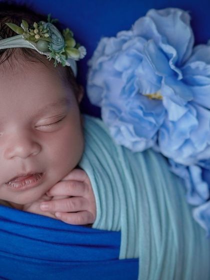 As snug as a bug. This close-up shows how peaceful a baby can be when properly swaddled, allowing me to capture their serene expression.
