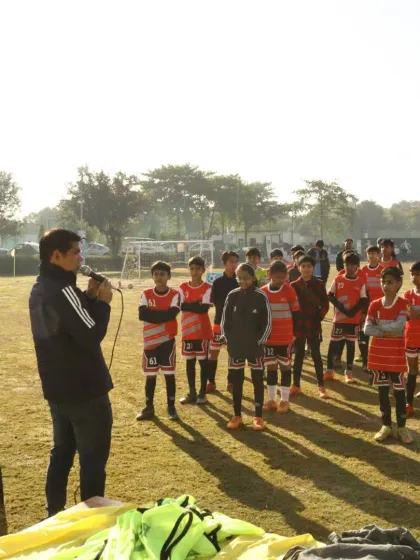 A coach addresses the players during our Republic Day event, speaking about the spirit of the game and the nation.