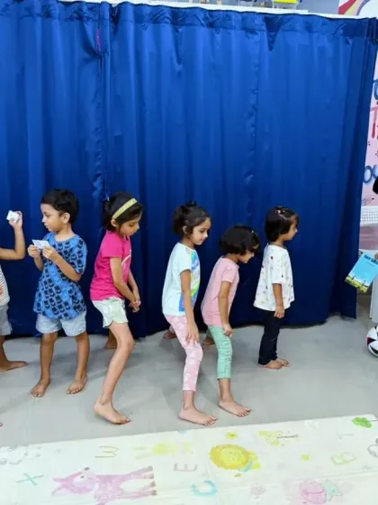 An activity following a reading of 'Silly Soccer'. The young author of the book leads the other children in a fun, story-related game, making the experience even more interactive.